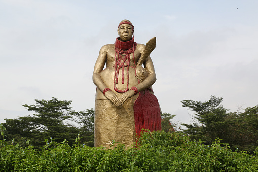 Benin Chief Statue standing tall at Oba Ovonramwen Square, Ring Road, Benin City, Edo State, Nigeria.
