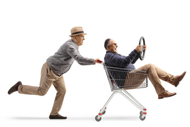 istock Elderly men having fun and riding inside a shopping cart 1483057224