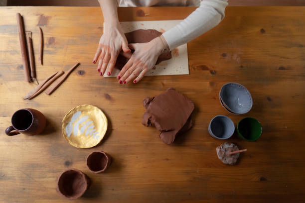 istock Ceramist artist female work in studio 1483059779