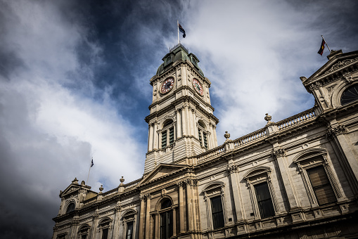 BALLARAT, AUSTRALIA - April 8 2023: The iconic architecture of the Ballarat Town Hall and now tourist information centre in the country Victorian town of Ballarat on a stormy autumn morning