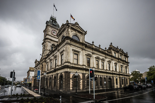 BALLARAT, AUSTRALIA - April 8 2023: The iconic architecture of the Ballarat Town Hall and now tourist information centre in the country Victorian town of Ballarat on a stormy autumn morning