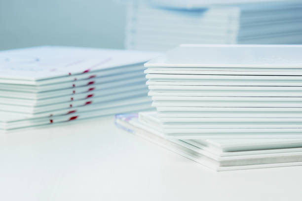 istock stacks of freshly printed photobooks on the table close-up 1483065421