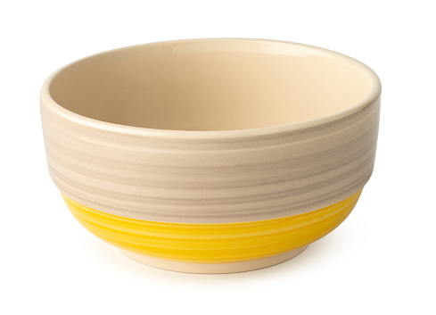 Empty ceramic bowl isolated on white background close up