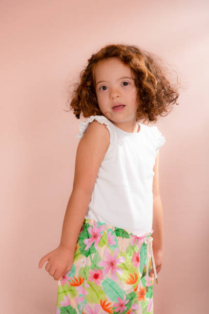 istock Beautiful little girl, standing, redhead, posing for the camera. 1483067139