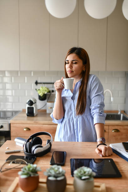 istock Beautiful Female Starting Day With A Cup Of Coffee 1483069486