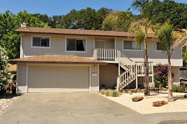 istock Two story single family house with driveway 148307088