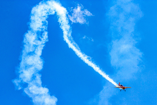 Aerobatic team First Flight performs demonstration flights on piston aircraft at the air show in Zhukovsky