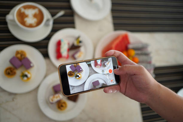 istock People taste delicious Dim sum and take photos 1483071565