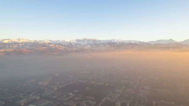 istock Epic gray smog is visible at sunset over the city 1483076067