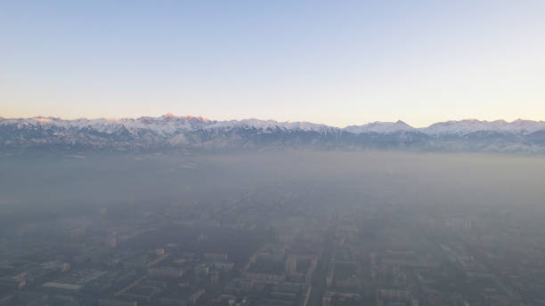 istock Epic gray smog is visible at sunset over the city 1483076079