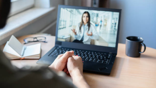 istock Young man making video call with doctor 1483076984