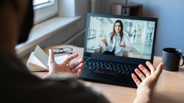 istock Young man making video call with doctor 1483076986