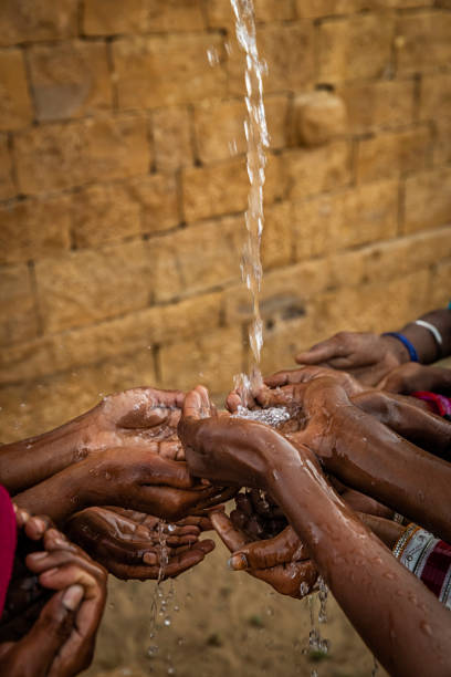 istock Poor Indian children asking for fresh water, India 1483077337