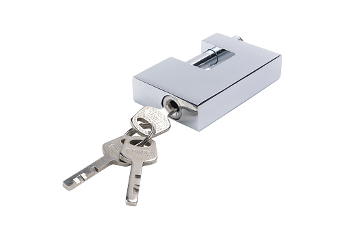 Blue key with silver keys on white background