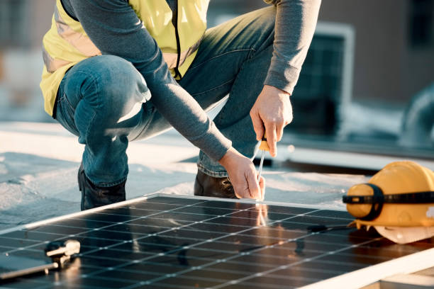 istock Solar panel, screwdriver and industrial worker hands with tools for renewable energy and electricity. Community innovation, roof work and engineering install a eco friendly and sustainability product 1483079674