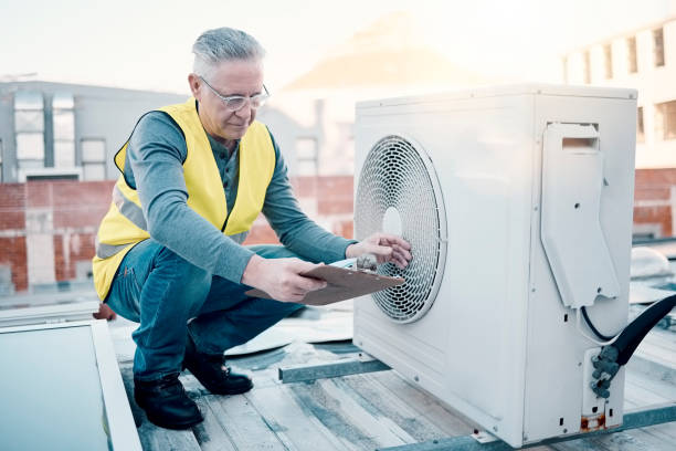 istock Engineer on rooftop, air conditioning and technician with clipboard, maintenance or repair machine. Male, worker or handyman with document, checklist or confirm working fan hvac for quality assurance 1483079687