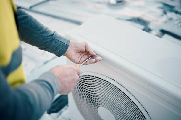 istock Hands, air conditioner and maintenance with a man construction worker on a rooftop to install a cooling system. Engineer, hvac and ac repair with a male handyman servicing a building closeup 1483079694