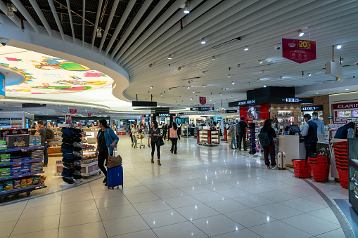 Barcelona Spain Nov 04 2019:crowd people tourists shopping and walking in Arenas de Barcelona big oval hall interior with escalator Arenas de Barcelona is new shopping mall with Placa Espanya