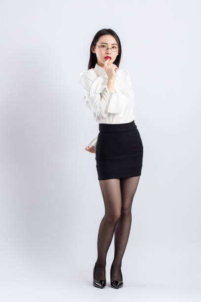 istock Beautiful female model posing in fashion studio 1483082335