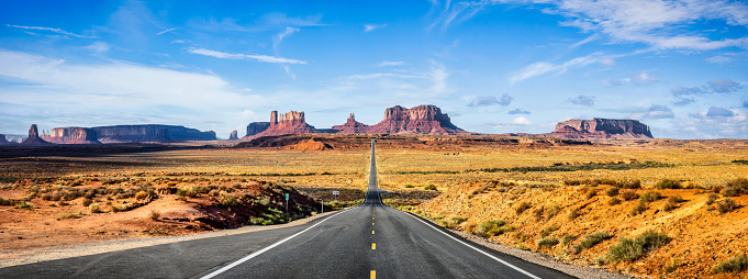Panoramic view of Road to Monument Valley U.S. Highway 163 at Forrest Gump Point in the morning. Utah