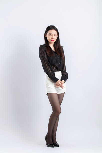 istock Beautiful female model posing in fashion studio 1483084501