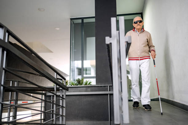 istock Active blind old person in front of apartment 1483084581