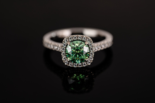 emerald engagement ring, jewelry with diamonds and gemstones