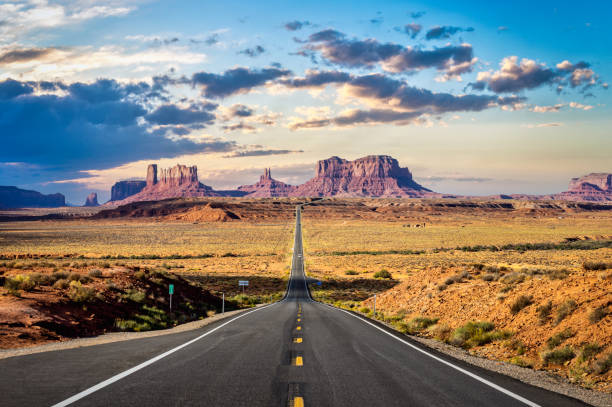 istock Long road at Monument Valley Utah side USA 1483085944