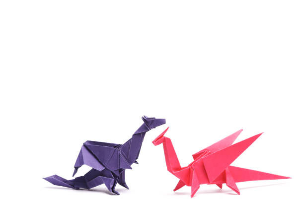 istock Paper origami dragons isolated on white background 1483085998