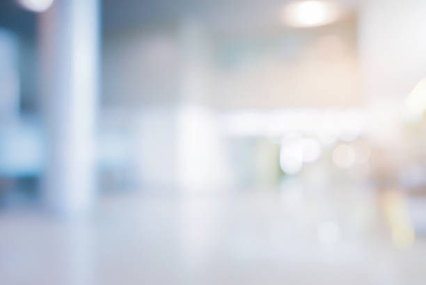 desenfoque abstracto dentro del fondo interior del hospital para el concepto de banner publicitario de display de diseño - movimiento borroso fotografías e imágenes de stock