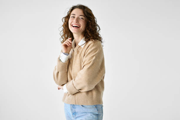 istock Young happy smiling woman standing at white background, portrait. 1483090205
