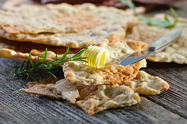 South Tyrolean bread specialty, so-called 'Schuettelbrot', a very crispy and dry rye flatbread, often served with cured bacon and smoked sausages