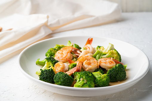 Stir Fried Broccoli with Shrimp in white plate