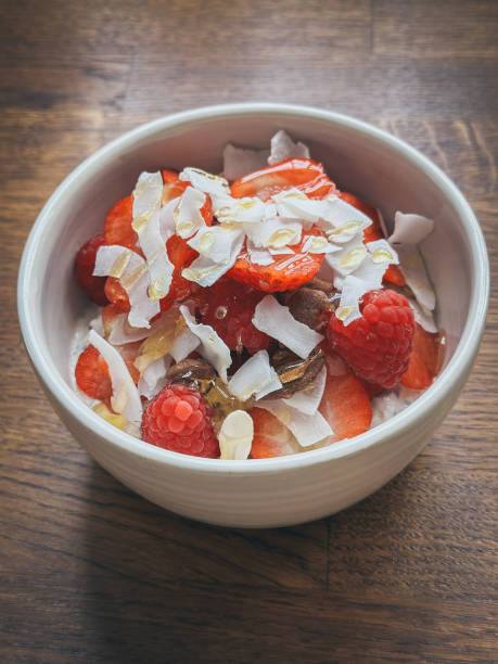 istock Overnight oats in a bowl with berries toppings 1483096835