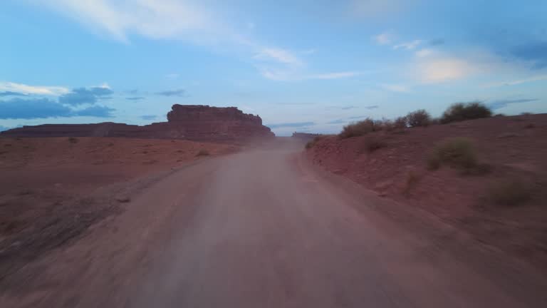 Driving Plate 4WD Off Road Utah Valley of the Gods Westbound Dusk Multicam Set 17 Rear View Southwest USA