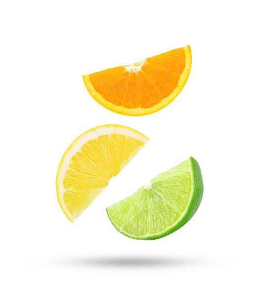 istock Fresh orange lemon lime fruit falling in the air isolated on white 1483100732