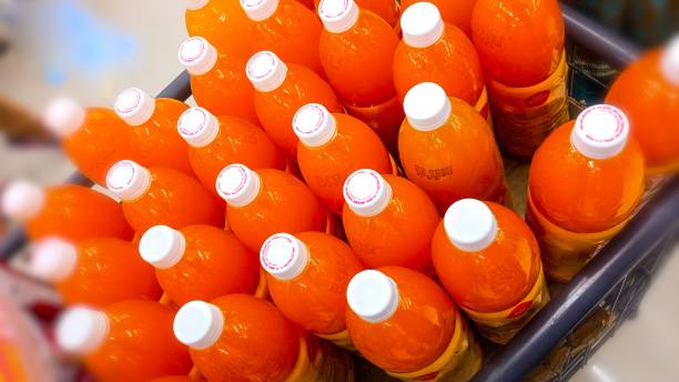 istock Mango juice packed softdrinksbottle in row market for sale 1483102314