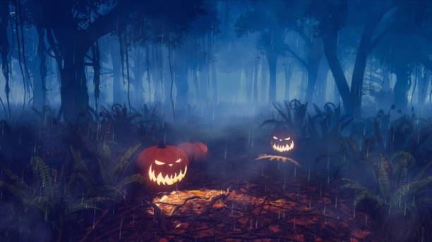 istock Halloween pumpkins on forest trail at rainy night 1483102880