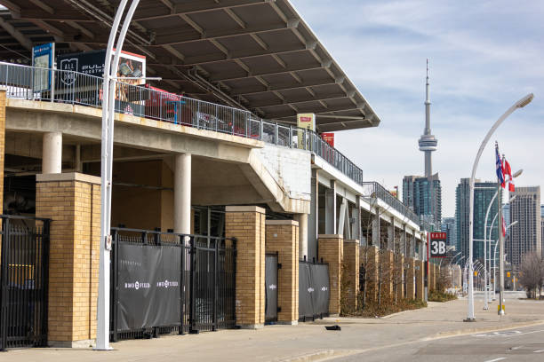 BMO Field on a sunny afternoon with the CN Tower in the background Toronto, Canada - March 24,2023 : BMO Field on a sunny afternoon with the CN Tower in the background entrence stock pictures, royalty-free photos & images