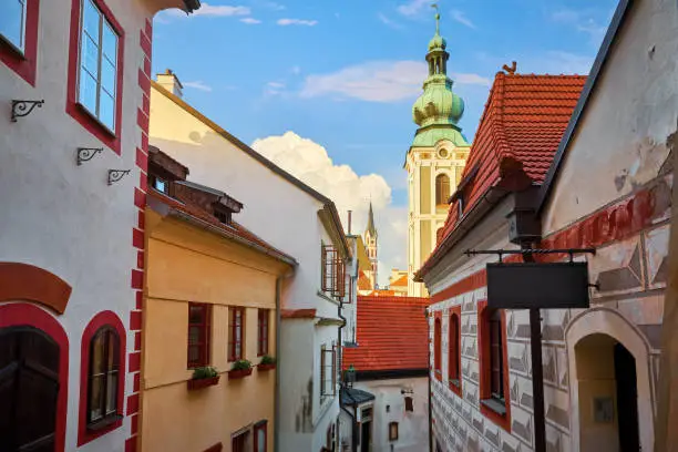 Czech Krumlov, Republic. Streetview at Saint Jost Church tower from the Medieval Antique Street with Old Houses of Ceski Krumlov