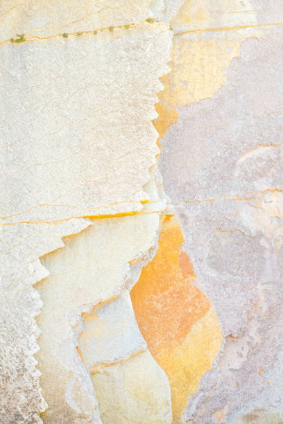 istock old damaged wall with layers in different colors as background 1483112449