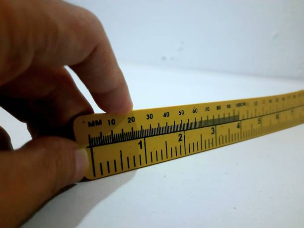 istock a long yellow ruler. copy space, measure, calculate, crop. 1483112560