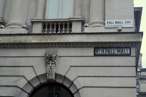 London, England August 20 2021: No. 9 Pall Mall, London. Street names and famous locations of London on the walls of this capital city.