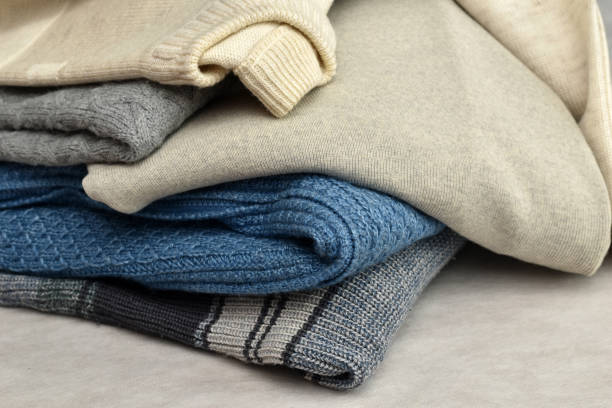 istock Warm clothes, a sweater, a jumper, lay down in a heap. 1483116168