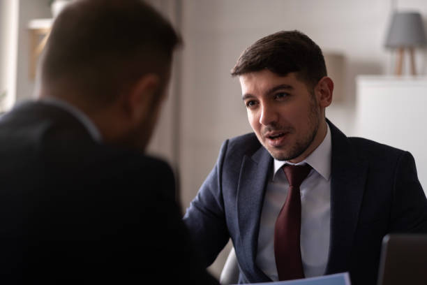 istock Business accounting concept, Business man using calculator with computer laptop, budget and loan paper in office. 1483116415