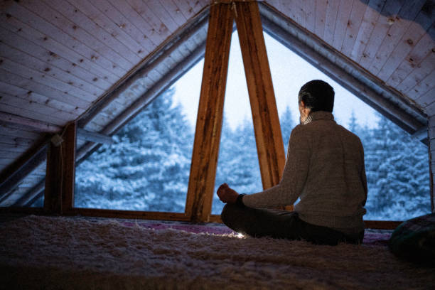 istock Cabin getaway. Man enjoys a log cabin retreat. 1483116745