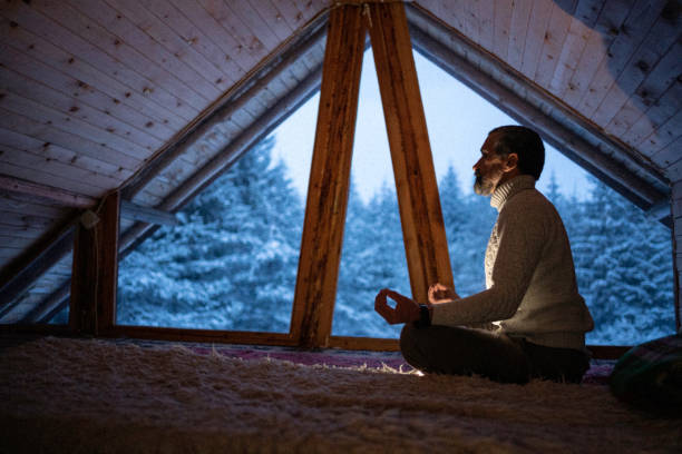 istock Cabin getaway. Man enjoys a log cabin retreat. 1483116765