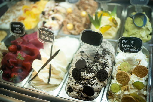 Ice cream flavors on display on a store