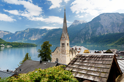 Scenic view of Hallstatt lakeside town in the Austrian Alps in beautiful evening light on beautiful day in autumn. Hallstatt, situated on Hallstatter See, a market town in the district of Gmunden.