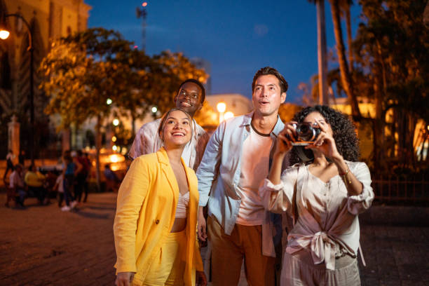 istock Traveler friends exploring a city by the night 1483121114